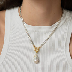 bold silver chain necklace with gold bolt ring closure and big real freshwater pearl necklace from sustainable fine jewelry company llr studios hamburg